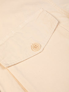 A buttoned patch pocket from the KESTIN Redford Jacket in Ecru Ripstop.