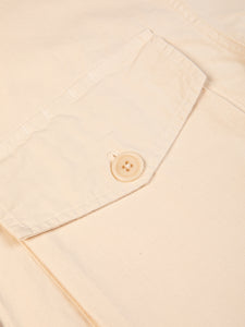 A buttoned patch pocket from the KESTIN Redford Jacket in Ecru Ripstop.