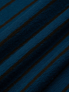 A textured cotton fabric with a stripe pattern.