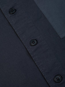 A close-up of the buttons to the front of the Rosyth Overshirt by KESTIN.