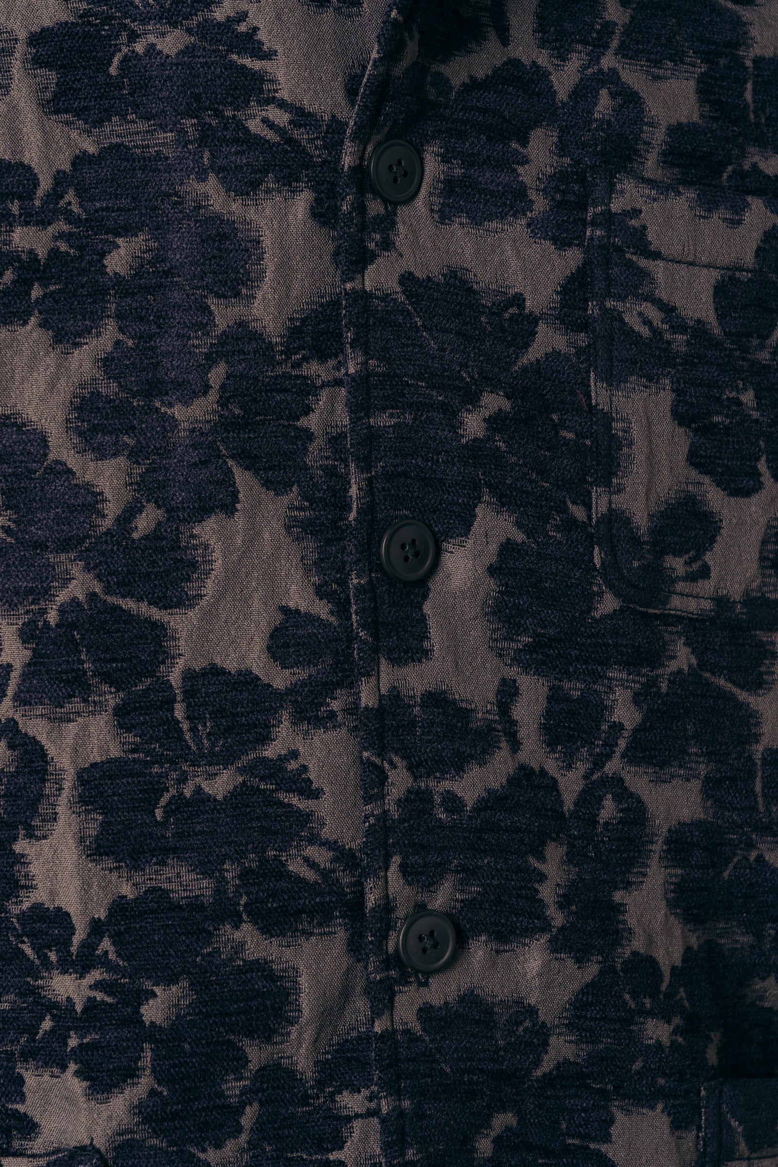 A Japanese Floral Jacquard fabric with Corozo buttons up the front.