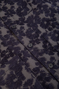 The buttoned front of the KESTIN Ormiston Jacket in a navy blue floral fabric.