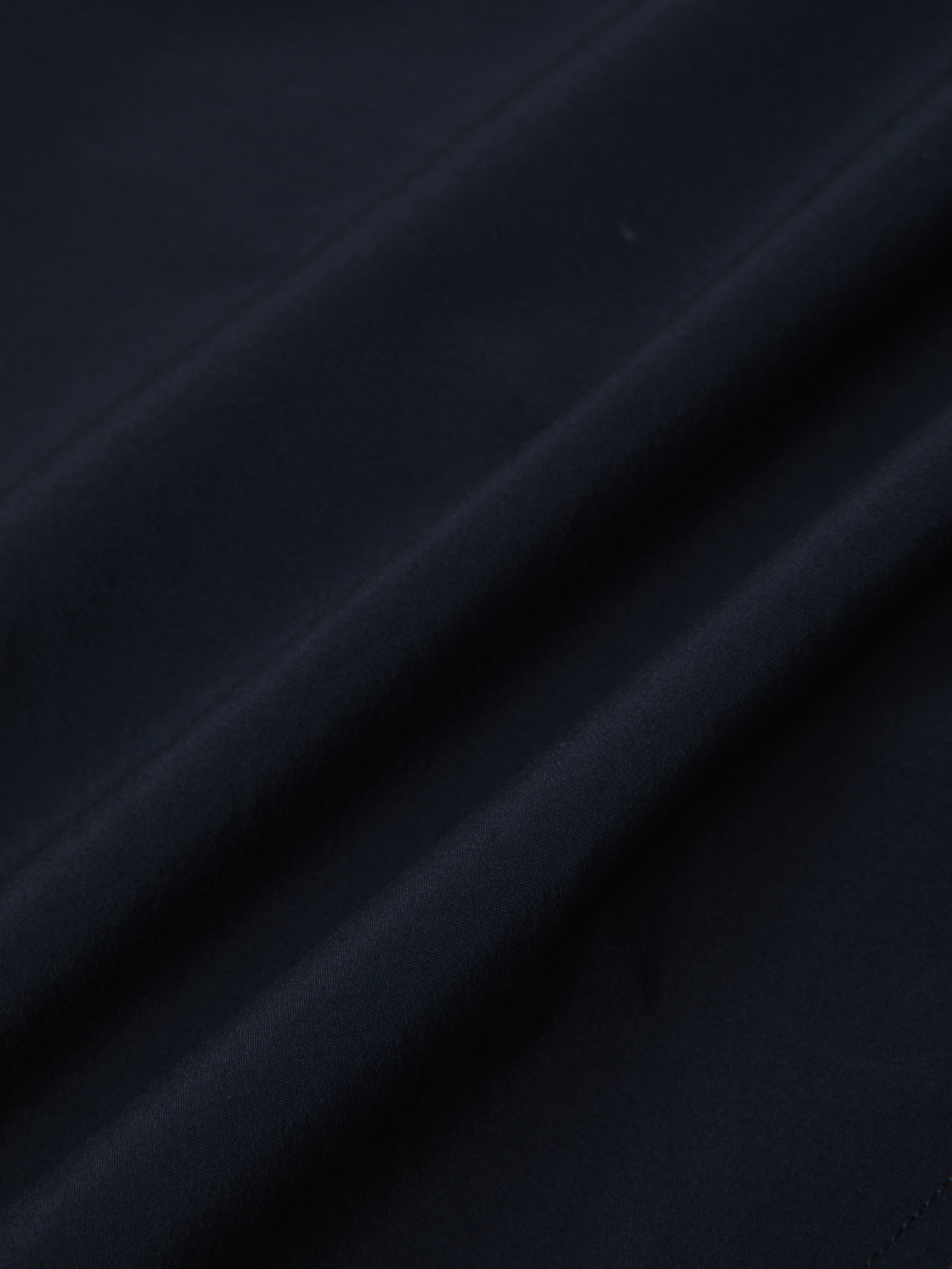 A navy blue fabric from 37.5 Technology, which regulates body temperature.