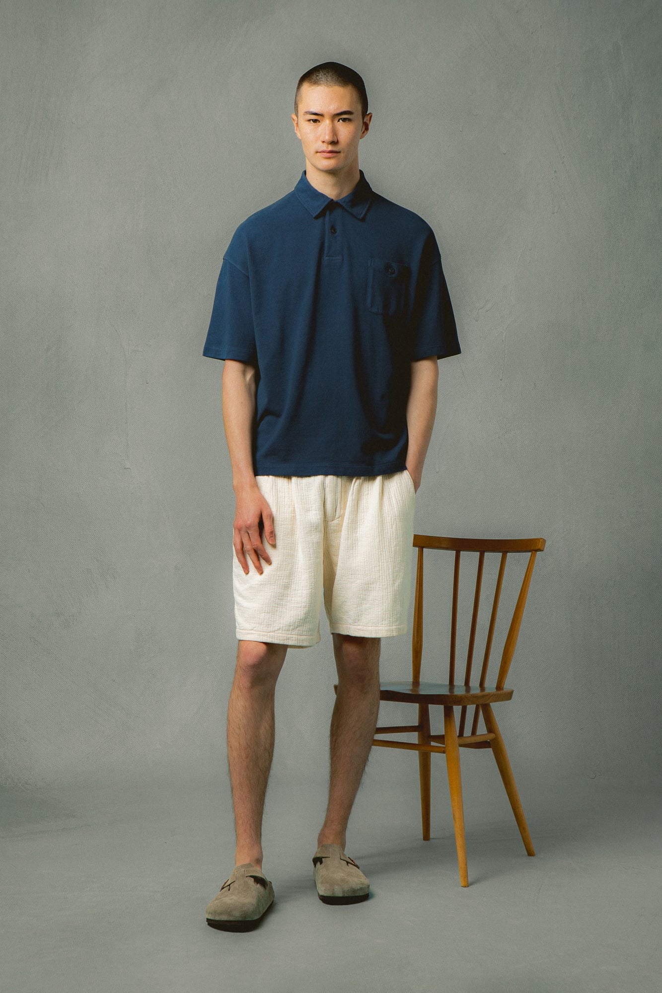 A man wearing a smart yet relaxed fit outfit from KESTIN.