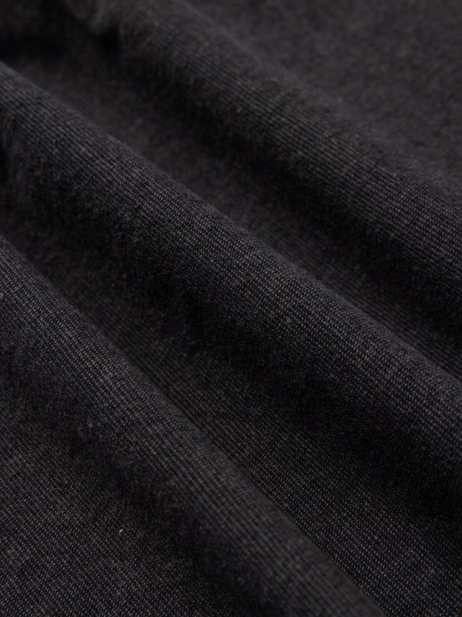 A blend of cotton and linen in a marl fabric, used to make suiting by Scottish menswear designer Kestin Hare.