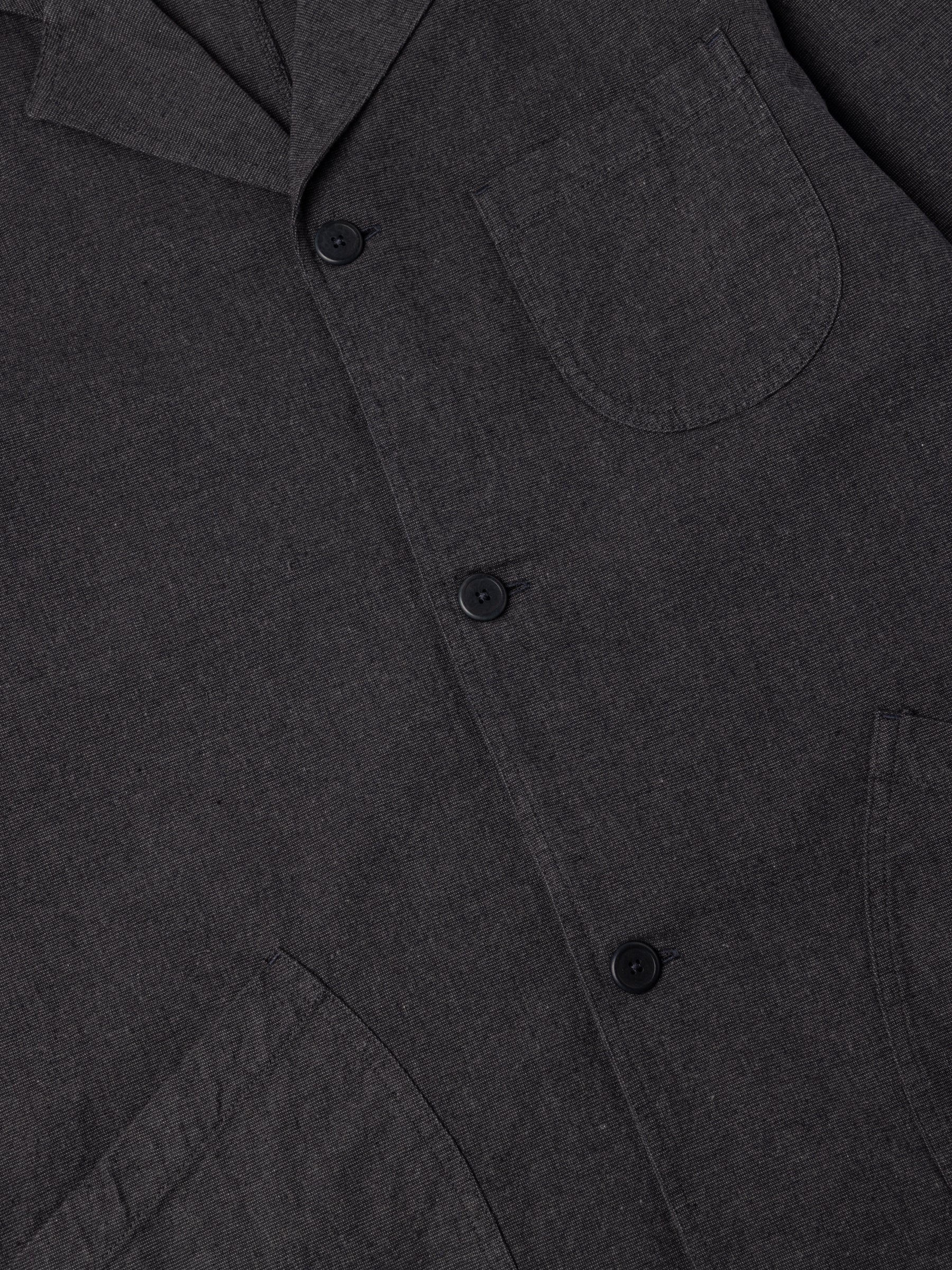 The front of the KESTIN Stac Blazer in Charcoal Marl, with three buttons and patch pockets.