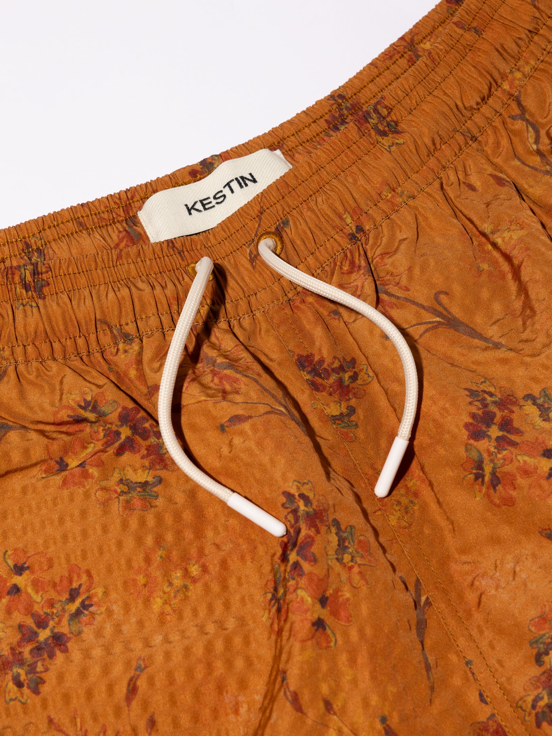 Seacliff Swim Shorts in Tangerine Floral SEAQUAL® Yarn