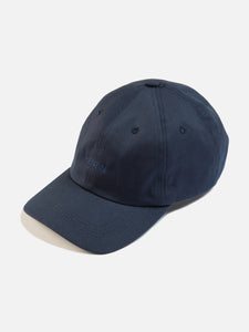 A six panel cap from Scottish menswear brand KESTIN, made from a navy cotton twill.