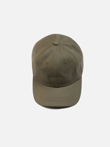 An olive green six panel cap from KESTIN, made in the USA from cotton twill.