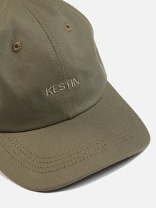 A six panel sports cap by designer menswear brand KESTIN with an embroidered logo.