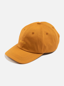 A six panel cap from designer menswear brand KESTIN, with an embroidered logo to the front.