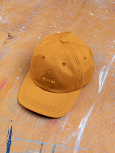 A six panel cap by designer menswear brand KESTIN with an embroidered logo to the front.
