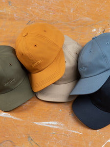 A collection of logo caps by designer menswear brand KESTIN, with embroidered logos to the front.
