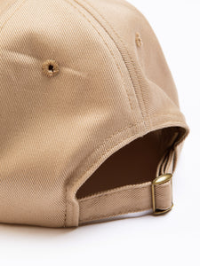 A six panel cap from Scottish menswear brand KESTIN, with an adjustable strap to the back.