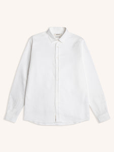 A men's white shirt, made from premium Japanese cotton, part of the KESTIN Suiting Collection.