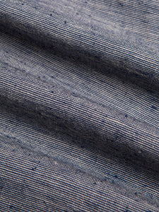 A textured blue slub fabric from Japan, used to make the KESTIN Dirleton Shirt.