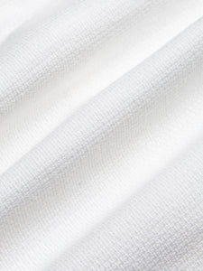 A premium textured Japanese shirting cloth, used by menswear designer KESTIN.