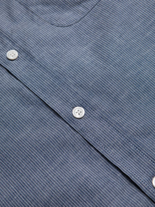 Imitation Mother Of Pearl buttons on the KESTIN Raeburn Shirt in a thin striped blue fabric.
