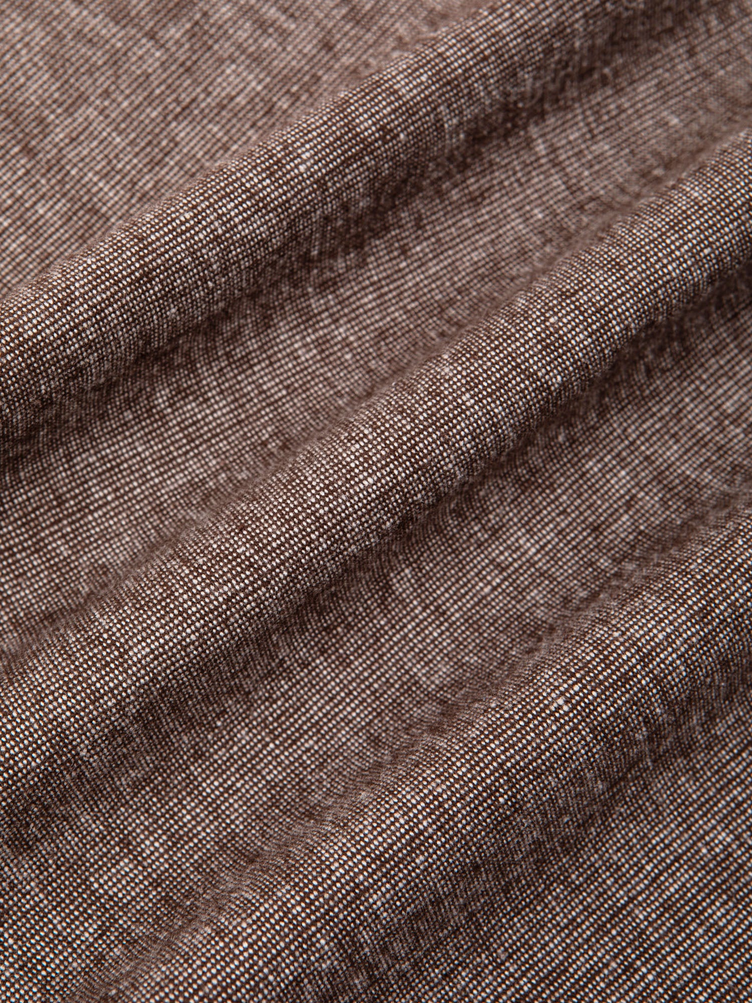 A brown marl fabric made from a blend of cotton and linen, used to make a KESTIN suit.