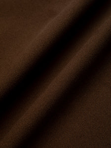 A brown cotton twill, used to make the workwear-inspired Neist Apron by KESTIN.