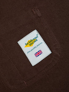 A woven logo patch to the inside of the Neist Apron by KESTIN.