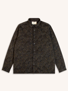 A shirt-jacket made from Japanese corduroy with a paisley pattern print.