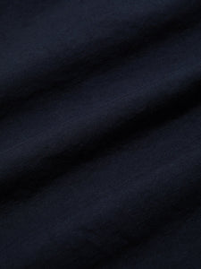 A cotton ripstop material used by KESTIN for the Wick Trousers in Navy.