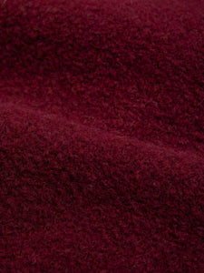 A Virgin Wool blend in dark red, used to make some of KESTIN's AW23 collection.