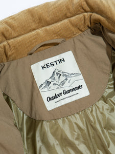A KESTIN Outdoor Garments neck label from a technical men's outerwear collection.