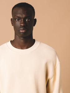 A model wearing the Humbie Sweatshirt by KESTIN, which is a comfortable waffle knit.