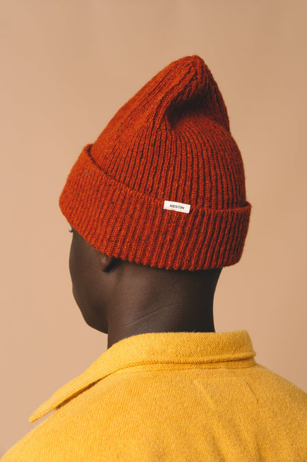 A knitted beanie, made in Scotland from a premium wool.