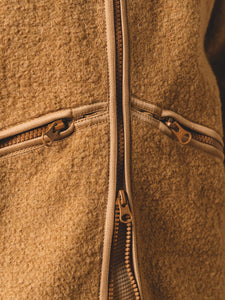 A warm winter fleece made from a Virgin Wool blend, with zip pockets.