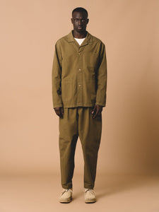 A model styling the men's Port Blazer and Clyde Pants by Scottish designer KESTIN.