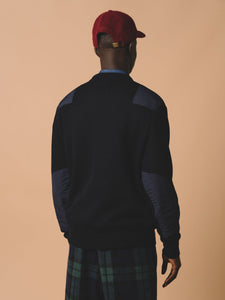 The back profile of the Cupar Nato Knit by KESTIN, made from recycled Japanese wool in navy blue.
