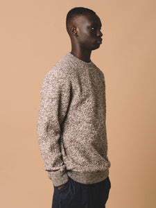 A model showing the side profile of KESTIN's Durness Sweatshirt.