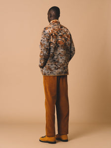 A model showing the back profile of the KESTIN Belhaven Fleece and Wick Trousers.