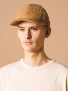 The Comets Cap by KESTIN, in a camel brown colour, made from wool.