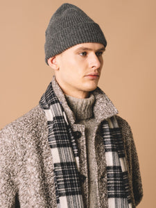 A model wearing made in Scotland knitwear and fleece from designer menswear brand KESTIN.