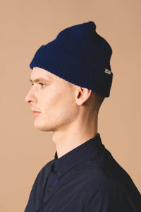 A men's lambswool beanie, made in Scotland by menswear designer KESTIN, in blue.