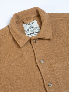 A warm winter chore coat, made from Italian fleece with an Outdoor Garments neck label.