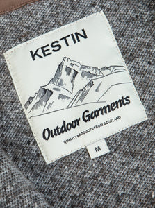 A neck label from the KESTIN Outdoor Garments collection, on a men's wool fleece.