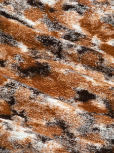 A warm Italian wool blend in a grey, white and orange camo design.