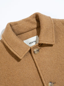 A close-up view of the collar of a premium Italian Wool Overcoat, made in the UK.