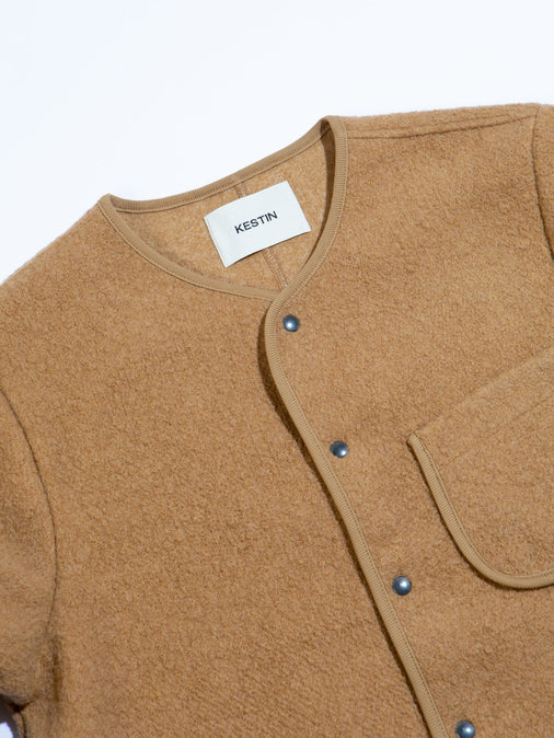 A close-up of the KESTIN Neist Fleece Cardigan in a Beige Brown colour.