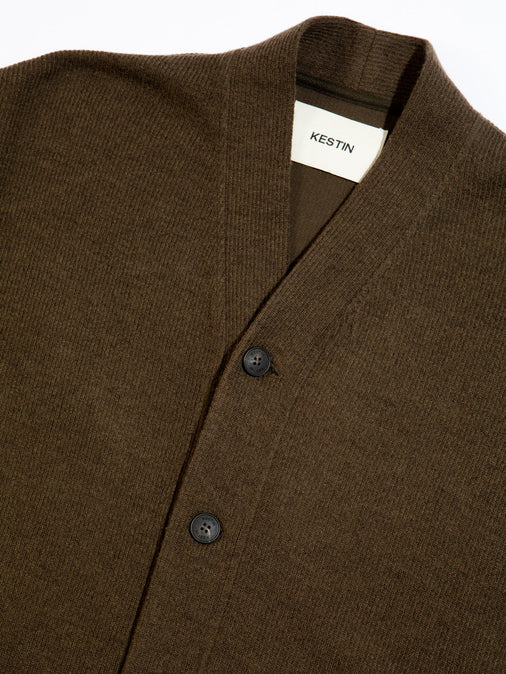 The buttoned front and collar of the KESTIN Glencorse Cardigan.