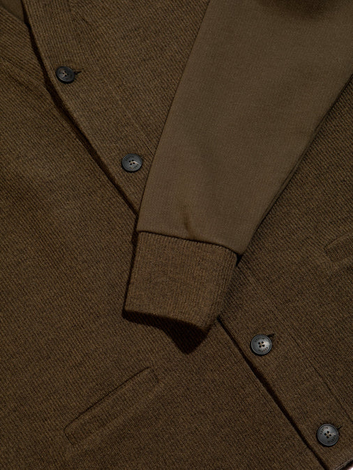 The ribbed cuff, buttoned front and pocket from the KESTIN Glencorse Cardigan.