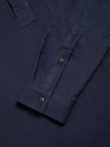 The buttoned cuff from the KESTIN Granton Shirt, designed in Scotland and made in Portugal from a comfortable Cotton Herringbone.