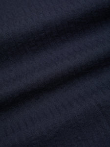 This close-up is of a premium Cotton Herringbone shirting, used to make the KESTIN Raeburn Button Down Shirt in Navy Blue.