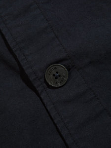A branded button from the Port Jacket, which is a casual men's blazer by KESTIN.