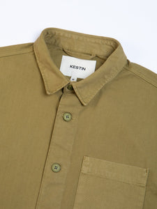 The Rosyth Overshirt by KESTIN, made from a green cotton twill.